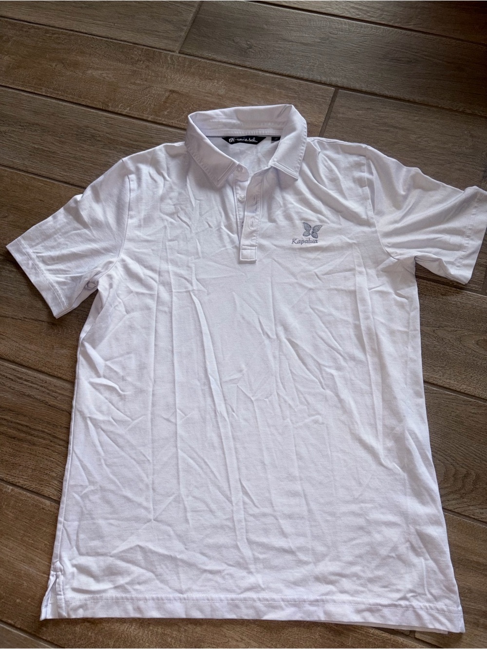 Travis Mathew butterfly logo of Kapalua Golf on the chest medium Maui Hawaii
